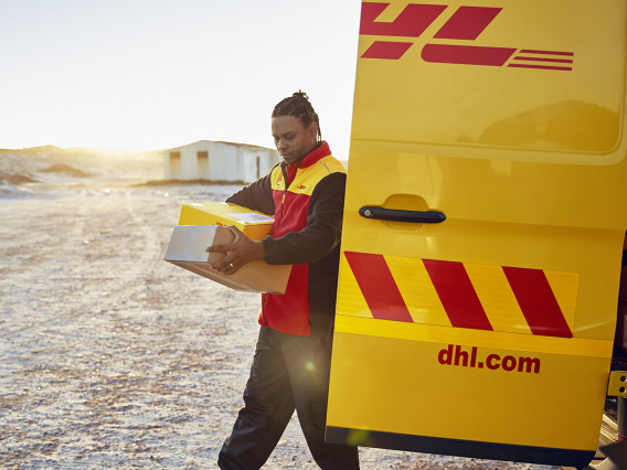 delivery-man-delivers-on-beach-0001